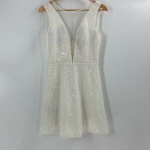 BCBGMaxazria cocktail dress shimmer fit & flare illusion neckline sequins